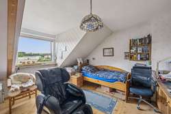 Schlafzimmer 1 im Dachgeschoss Schlafzimmer 1 im Dachgeschoss